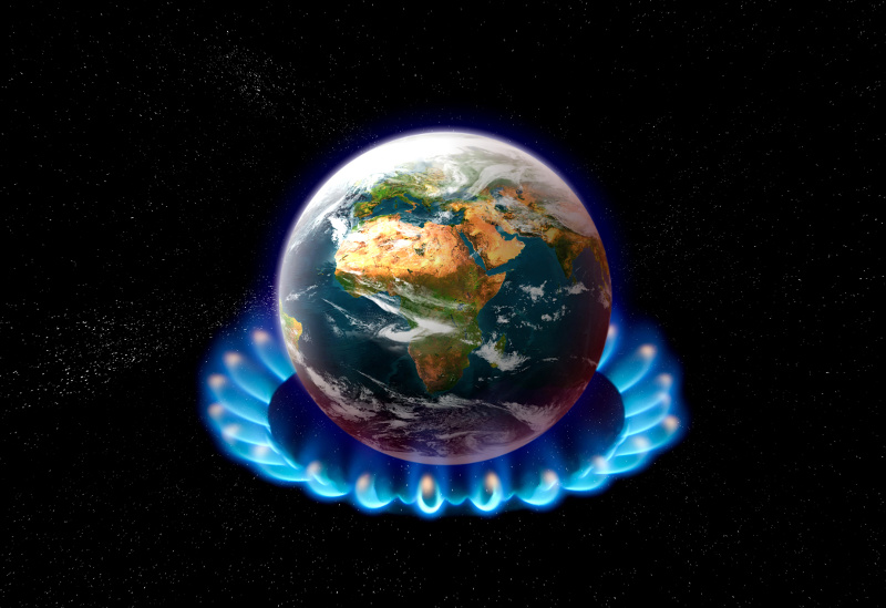obrazek przedstawia ziemię umieszczoną na palniku gazowym